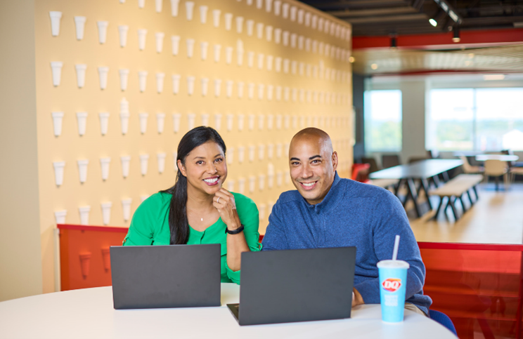 two people working at a table